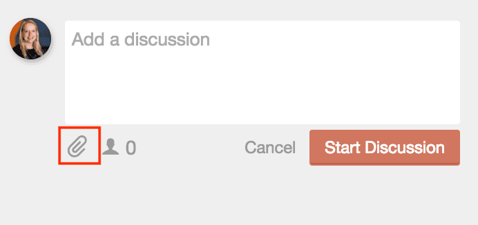 Discussion box with the paperclip icon highlighted, used to attach a file to a comment.
