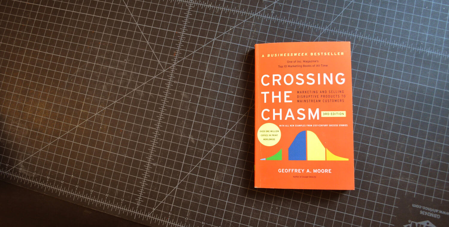 Book cover of Geoffrey A. Moorre's "Crossing The Chasm"