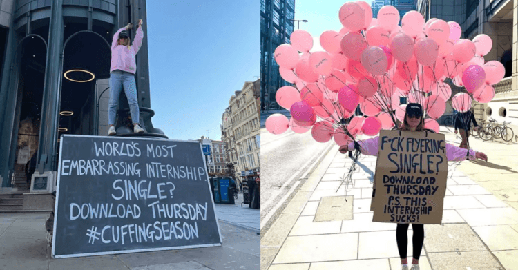 A photo of a woman tired to a pole, standing next to a sign that reads, "Worlds most embarrassing internship. Single? Download Thursday #cuffingseason" 