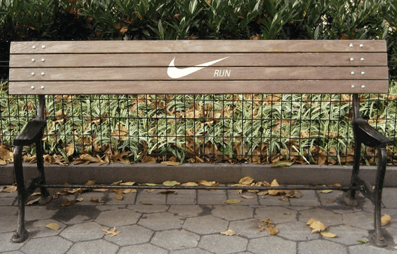 Nike run advertisement on park bench