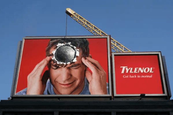 Tylenol wrecking ball billboard ad