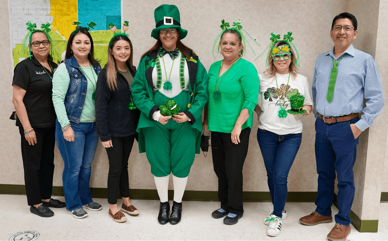 Staff members dressed up for a St. Patrick's day theme