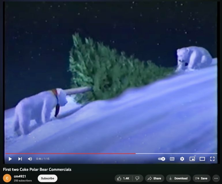 Coca Cola commercial featuring the cartoon polar bears pushing a tree up a hill.