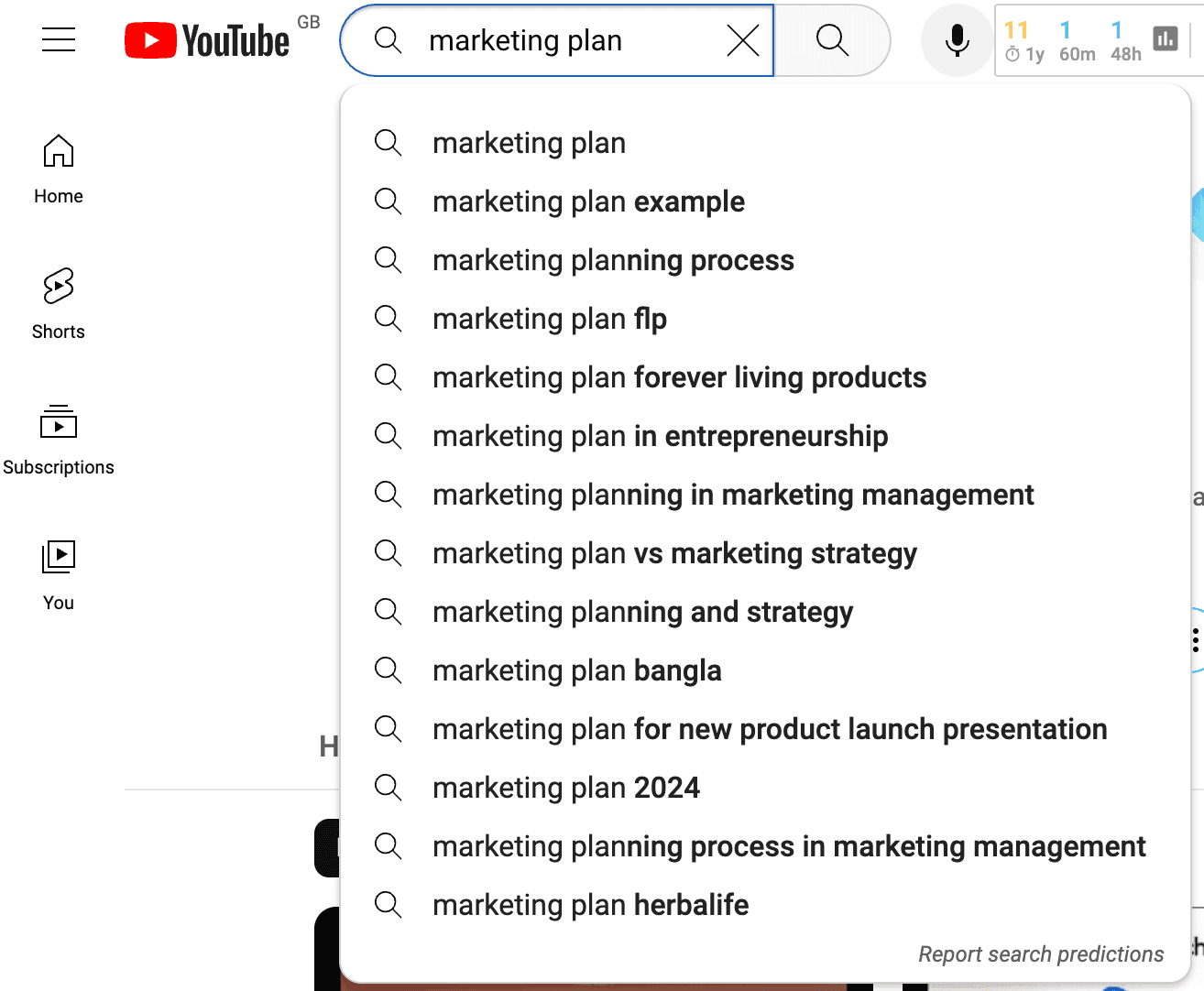 Marketing plan YouTube search with dropdown menu displayed