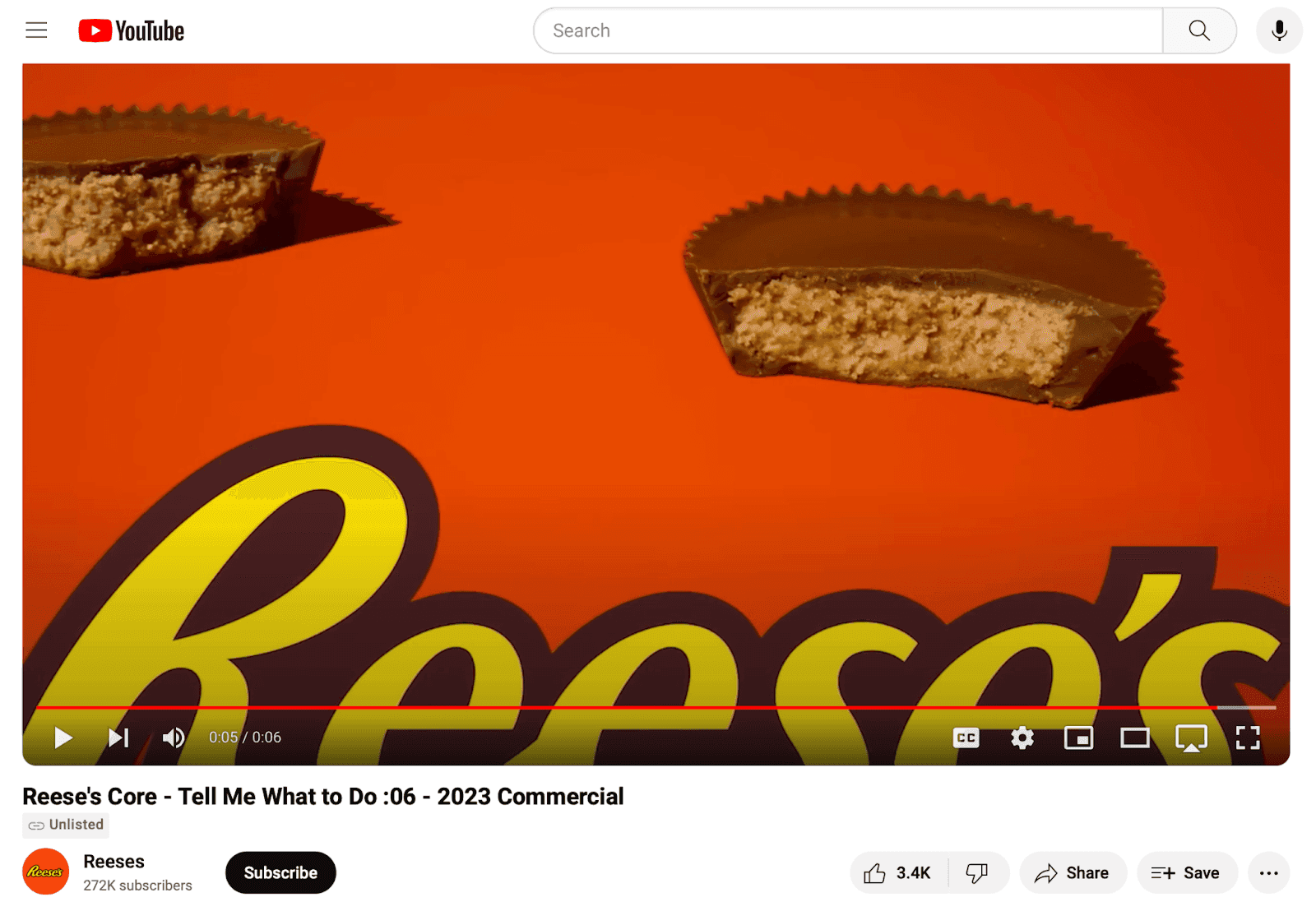 youtube video with a close up of reese's peanut butter cups with an orange background