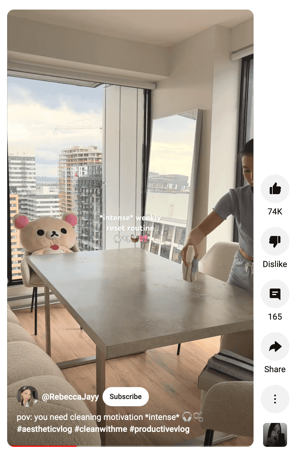 Dining room in an apartment with a view of a city
