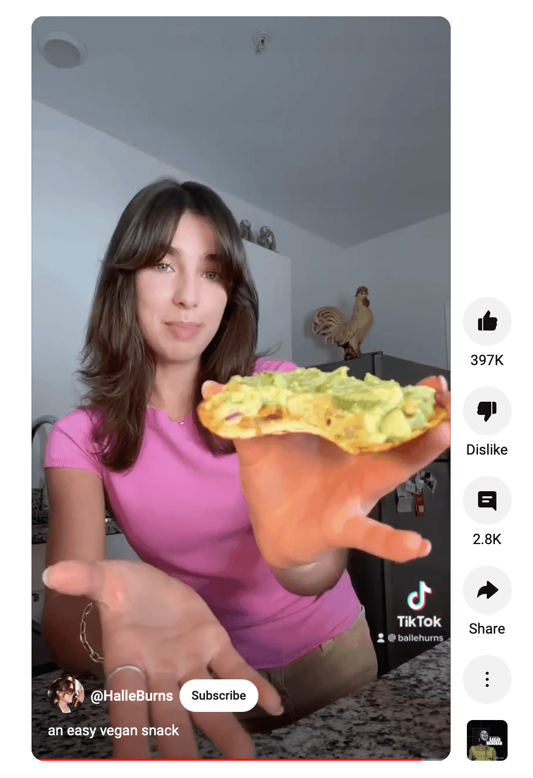 Woman holding a vegan snack