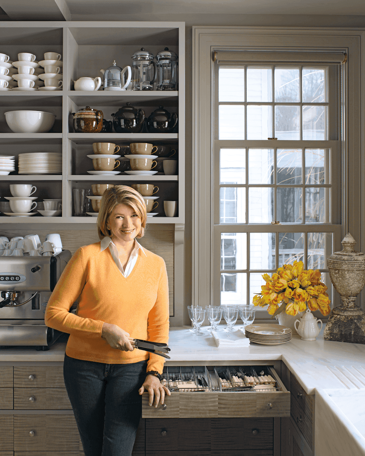 Martha Stewart standing in her kitchen